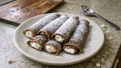 Necci toscani in padella: crespelle di farina di castagne con ricotta e zucchero