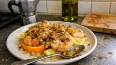 Gamberi gratinati al forno con limone e arancia: crosticina dorata in 10 minuti