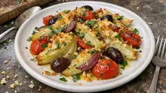 Finocchi alla mediterranea al forno: pomodorini, olive e gratinatura croccante