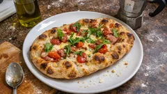 Pinsa romana fatta in casa: impasto leggero e alveolato con 24 ore di maturazione